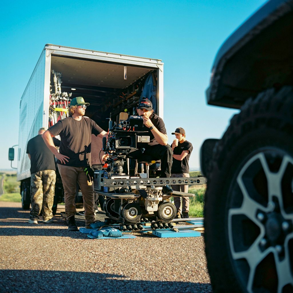 Director of Photography Bruce James Bales works with his Dolly Grip to set up a dolly shot on a feature film. 